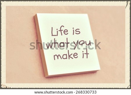 Text life is what you make it on the short note texture background