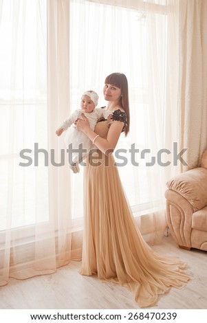 picture of beuty young mother with adorable baby