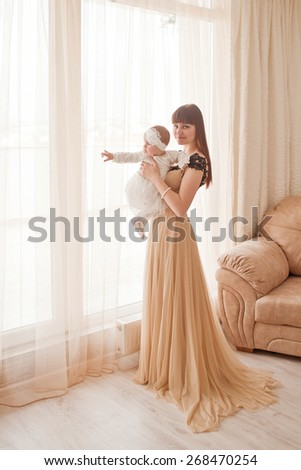 picture of beuty young mother with adorable baby