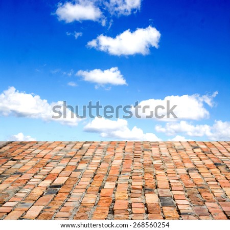 red brick floor against the sky