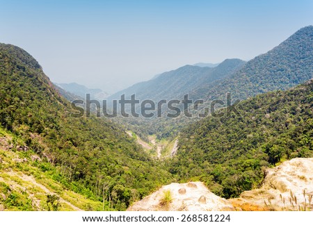 Beautiful view of the mountains on the Langbian Plateau around Da Lat city (Dalat) on the blue sky background in Vietnam. Da Lat and the surrounding area is a popular tourist destination of Asia.