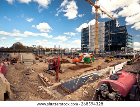 excavator on construction site Royalty-Free Stock Photo #268594328