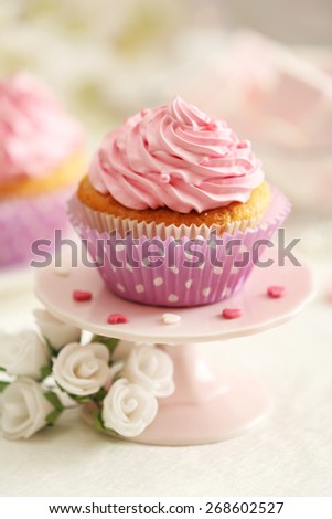 Delicious cupcakes on table  close-up