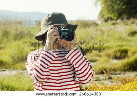 woman photography with camera  nature environment concept