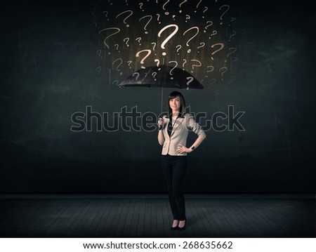 Businesswoman with umbrella and a lot of drawn question marks concept on background