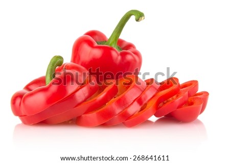 Studio shot of slices of red bell peppers isolated on white background