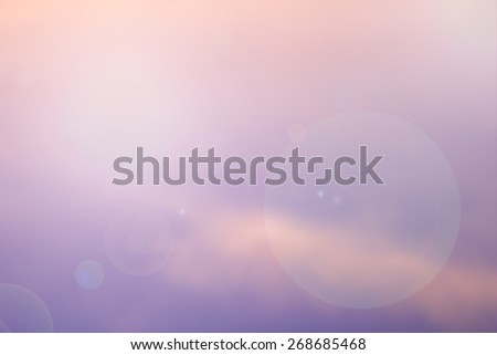 blurred backgrounds of sunrise with flare light.