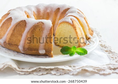 Bundt Cake  with Sugar Glaze on white background