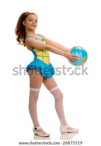 Cute girl with a  gymnastic ball in her hands, isolated on white background