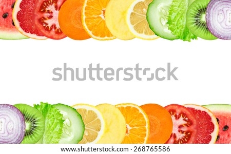 Color fruit and vegetable slices on white background. Food concept Royalty-Free Stock Photo #268765586