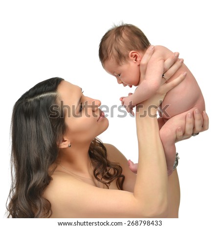 Happy young mother woman holding 3 weeks infant child baby kid girl and smiling on a white background