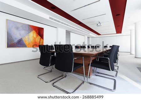 Boardroom with long table in the business centre