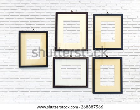 photo frame on white brick wall texture background
