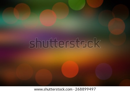 abstract blurred circular bokeh background of city night light with filtered color.