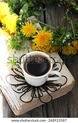 Cup of coffee on a wooden table
