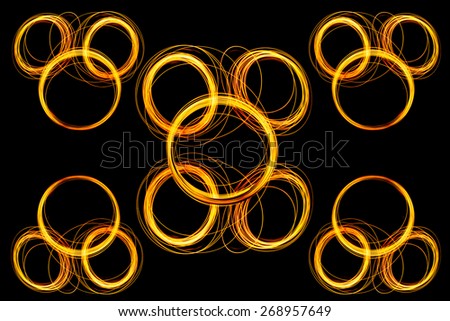 Abstract long exposure neon lights orange cycle texture soft focut.