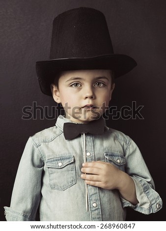 Vintage style photo of a cute young boy