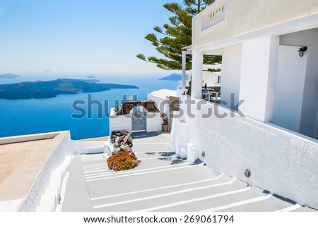 Luxury hotel with sea view. White architecture on Santorini island, Greece. Beautiful summer landscape