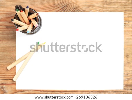 Still life concept. Pencils lying on a paper. Selective focus, top view, copy space background