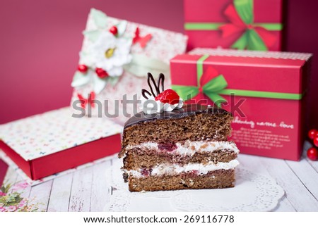 Picture close up on set of cake and gift decorations