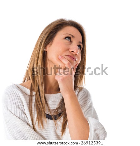 Woman having doubts over white background