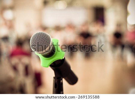 Close up of microphone in conference room on blurred background