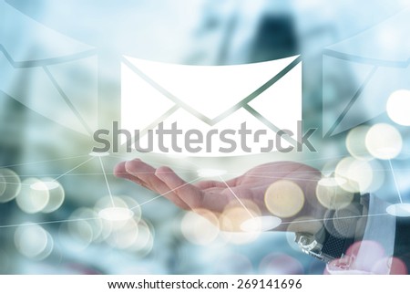 Businessman holding mail envelope