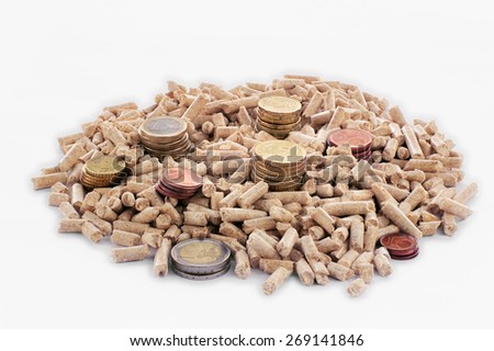 Euro coins and wood pellets in a white background
