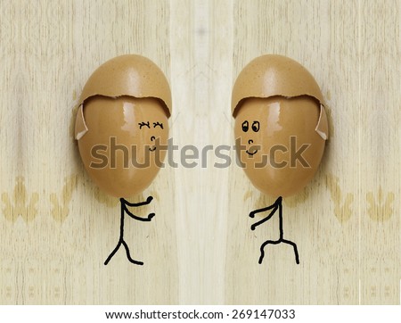 two happy friend with painted egg