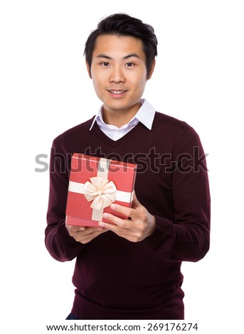Asian businessman with red gift box