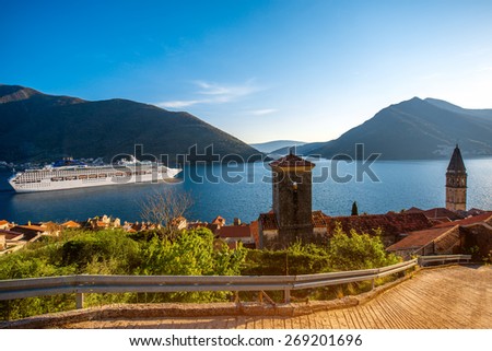 View on Kotor bay from Perast city with cruise liner and mountains on background