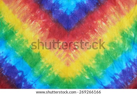 colourful tie dyed pattern on cotton fabric for background.