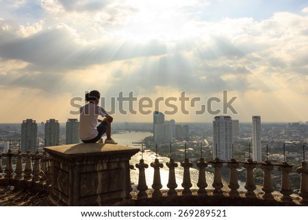  looking fot beautiful sunset and chao phraya river and high building sky scrapper in heart of bangkok thailand Royalty-Free Stock Photo #269289521