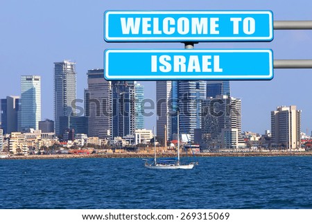 Blue road sign " Welcome to Israel " - the invitation to the Israel ( visit and travel) against the Tel Aviv coast view. Mediterranean, Israel