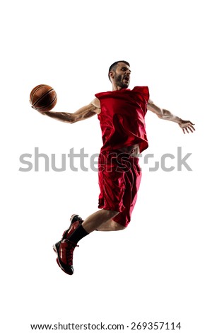 Basketball player in action isolated on white background Royalty-Free Stock Photo #269357114