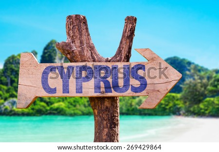 Cyprus wooden sign with beach background