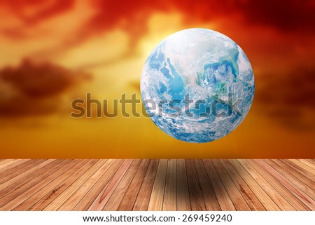 Earth's day theme with global and blur sunset with wood pave way Elements of this image furnished by NASA