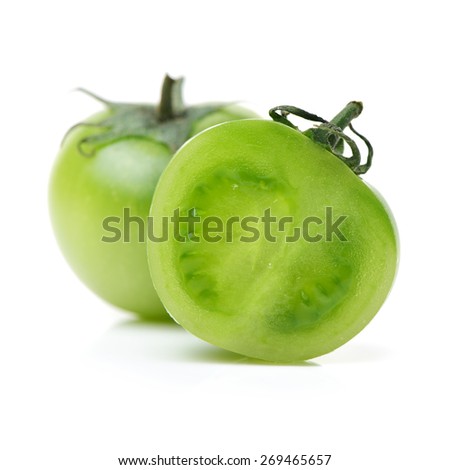 Green tomatoes on white background