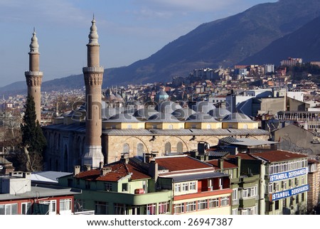 Mosque Eski Jami with cupolas and minaret in Bursa Royalty-Free Stock Photo #26947387