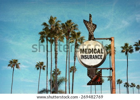 aged and worn vintage photo of medical insurance sign