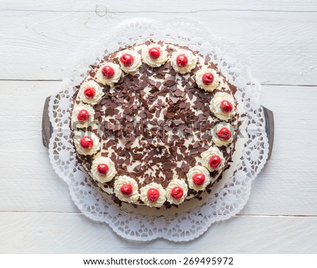 Black Forest cake on white wooden. Royalty-Free Stock Photo #269495972