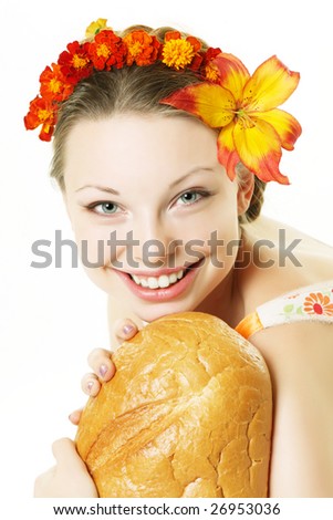 Picture of the smiling girl with a great bread