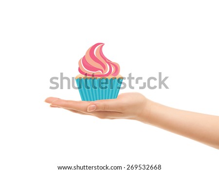 Picture of woman's hands holding a cupcake isolated on white