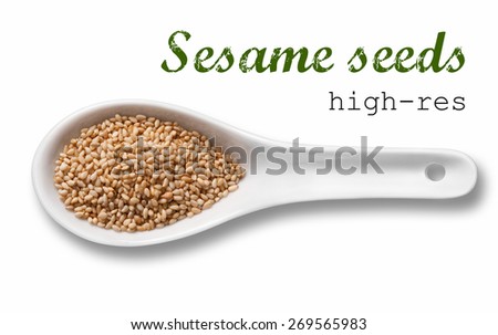 Sesame seeds in a wooden spoon / high resolution product photography of seed in white porcelain spoon over white background with place for your text