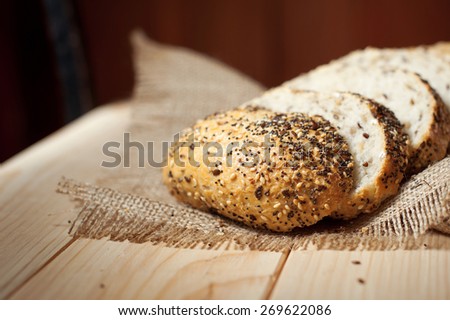 Freshly bread on wooden table