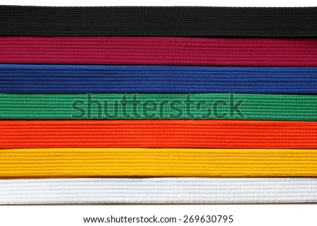 Martial Art belts in seven colors background Royalty-Free Stock Photo #269630795