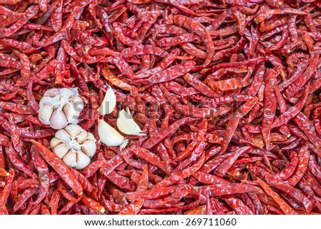 dried red peppers and garlic texture background