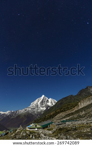 Taboche peak in the Moonlight. View from Chhukhung village - Everest region, Nepal, Himalayas