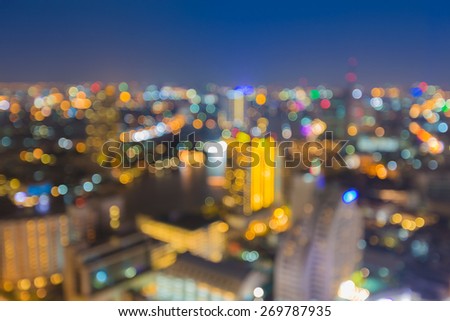 Blur bokeh lights background of city along river