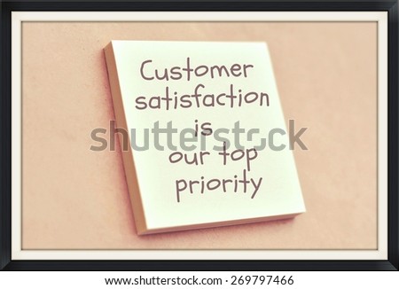 Text customer satisfaction is our top priority on the short note texture background